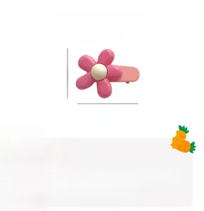Detail showing pink flower hair clip dimensions with a size of 5cm by 3.3cm for girls