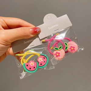 Elastic kids hair ties set featuring cute resin watermelon and peach fruit designs