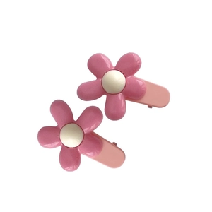 Set of two sweet pink flower hair clips with white centers for girls and toddlers