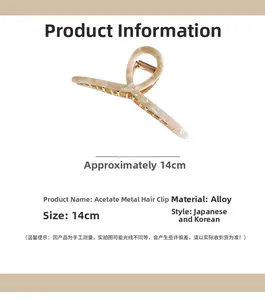 Detailed view of a 14cm pearly white acetate claw clip with alloy metal components