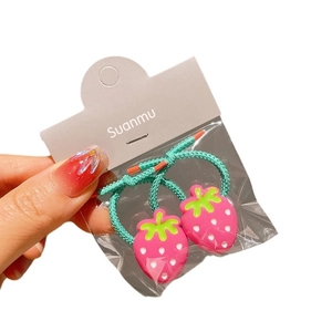 Pair of mint green elastic hair ties with cute pink resin strawberry charms for girls