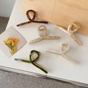 5-piece large acetate hair claw set featuring tortoiseshell and marble patterns in French style
