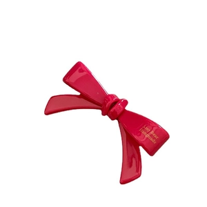 Barrette à cheveux avec nœud papillon magenta brillant en acétate et texte doré Amy Bear