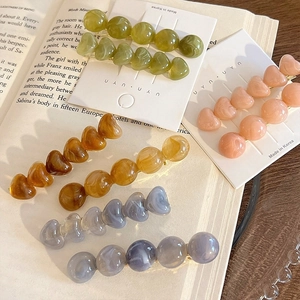Sweet jelly-textured resin heart and bead hair clips in olive, amber and pink tones