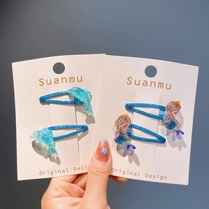 Lot de jolies barrettes pailletées sirène et dauphin bleues pour petites filles sur carte