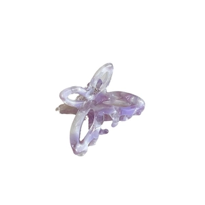 Elegant butterfly hair claw clip with purple marble pattern and acetate texture