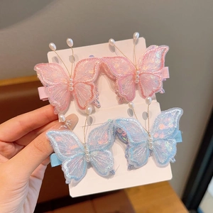 Lot de quatre barrettes papillon brodées avec perles et paillettes pour petites filles