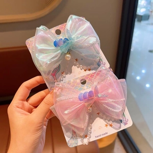 Barrettes à cheveux sirène irisées avec décor de coquillage et glands de perles