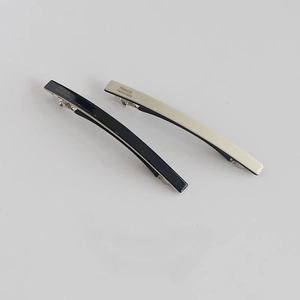 Set of two minimalist acetate hair clips in navy blue and ivory with handmade detail