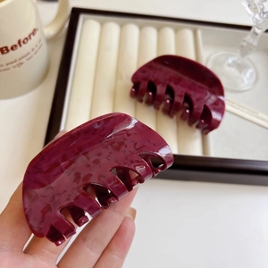 Elegant rose red marble texture hair claw clip for women with minimalist curved shark design