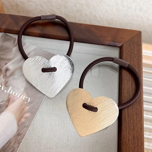 Brushed metal heart hair ties in gold and silver finish with high elasticity bands