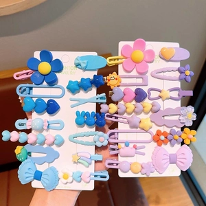 Assortiment de barrettes colorées avec motifs fleurs, étoiles et lapins pour filles