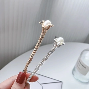 Vintage metal flower hair pin with pearl accent in gold and silver finish