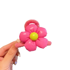 Pink 3D puff flower hair scrunchie with yellow center for girls daily styling