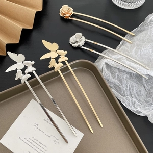 U-shaped hair pins with gold and silver butterfly and flower motifs for elegant buns