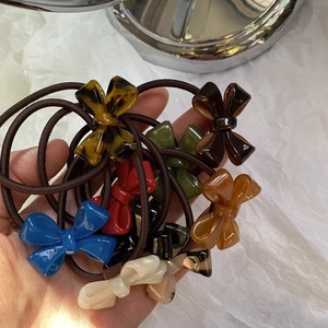 Set of 8 colorful resin bow hair ties with high elasticity and glossy finish