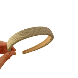 French style sponge headband in woven green fabric for a high skull top look
