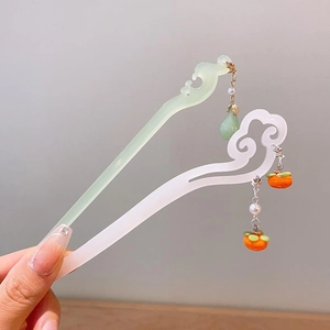 Vintage Lily of the Valley hairpins with persimmon charms and acrylic tassels in retro style