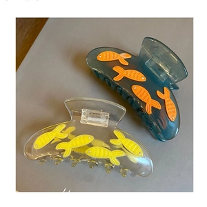 Translucent blue fish hair claw clips with creative acetate design and small orange fish