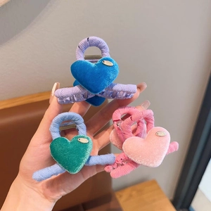 Three-piece velvet heart-shaped hair claw clips for girls in blue, green, and pink colors