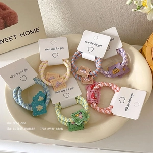Set of 6 cute macaron-colored elastic hair ties with woven design and butterfly charms