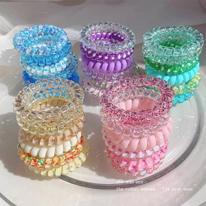 Élastiques à cheveux spirales en fil de téléphone avec motifs d'étoiles et couleurs