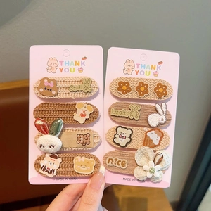 Sweet knitted cartoon hair clips set featuring cute animal and flower designs for girls