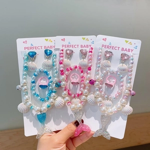 Mermaid tail necklace and pearl bracelet jewelry set for girls in pink and blue colors