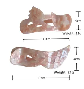 Iridescent acetate floral hair clips showing dimensions and weights for each hair accessory