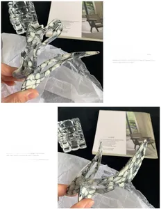 Detail view of the black and white marble acetate hair claw clip with sturdy metal spring