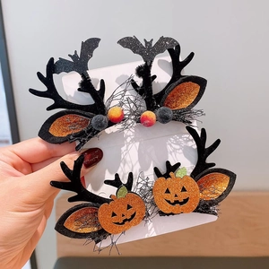 Halloween kids hair clips set with black reindeer antlers bat and pumpkin motifs