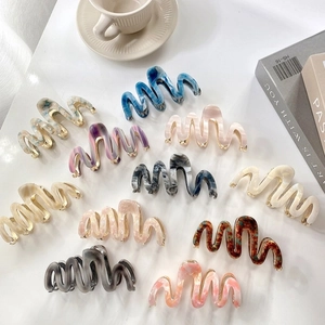 Pinces à cheveux élégantes en acétate ondulé aux divers coloris marbrés et nacrés
