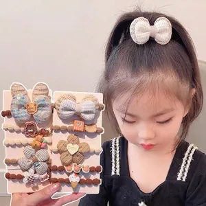 Cute milk coffee colored floral hair tie set for girls featuring soft bow and bear charms