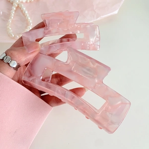 Pink marble acetate hair claw clip set with elegant geometric hollow design for women