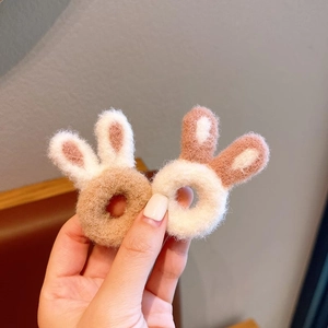 Cute plush rabbit ear hair ties made of soft sherpa fleece for girls and children