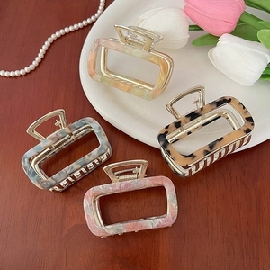 Set of 4 vintage square acetate hair claws in tortoise shell and marble patterns