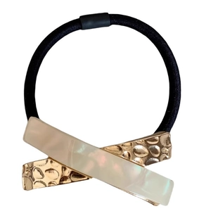Elegant X-shaped hair tie featuring gold metal and pearl acrylic on black elastic band