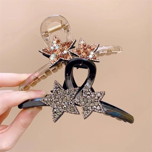 Lot de deux pinces à cheveux étoiles avec strass en acrylique champagne et noir