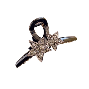 Pince à cheveux noire élégante ornée d'étoiles en strass scintillantes pour coiffure