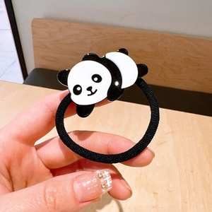 Macro view of cartoon panda hair tie showing high-elastic band and acrylic ornament
