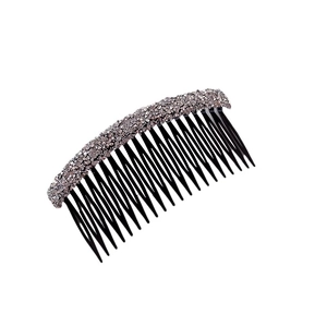 Strass argentés étincelants sur un peigne à cheveux noir incurvé pour une coiffure élégante