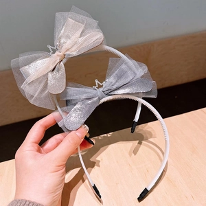 Lace bow headbands with sequin crown accents for girls in champagne and silver