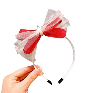 Kids lace crown headband with large red and white bow and silver stars for parties