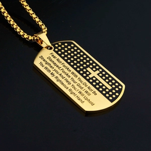 Close-up of gold stainless steel cross pendant with engraved Bible verse and box chain