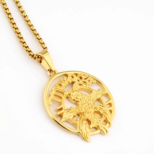 Close-up of golden stainless steel necklace with engraved mama text and hummingbird pendant