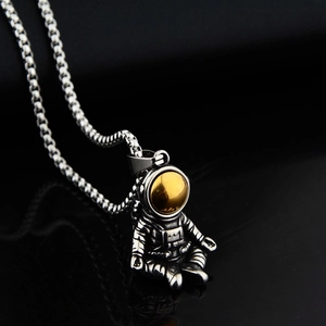 Hip hop astronaut pendant necklace in vintage silver steel with gold face mask detail