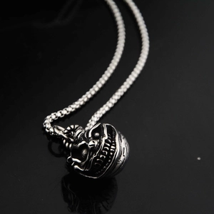 Punk style skeleton skull pendant with vintage silver finish on a box chain necklace