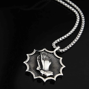 Vintage stainless steel praying hands medallion necklace with a sturdy box chain
