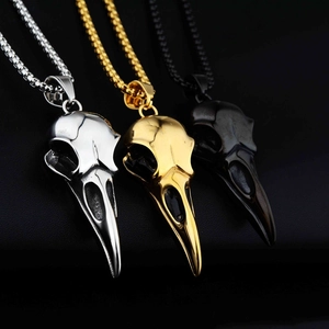 Pendentif tête de corbeau gothique en acier inoxydable argent, or et noir