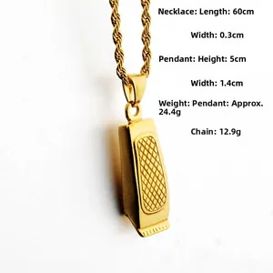Detail view of gold hip hop hair clipper pendant with technical size measurements